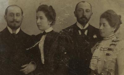 [Photograph of two men and two women]