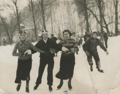 [Photograph of Ida Kaplan skating with friends]